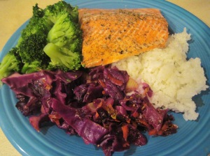 Tonight's meal is baked salmon with steamed broccoli and sautéed red cabbage.